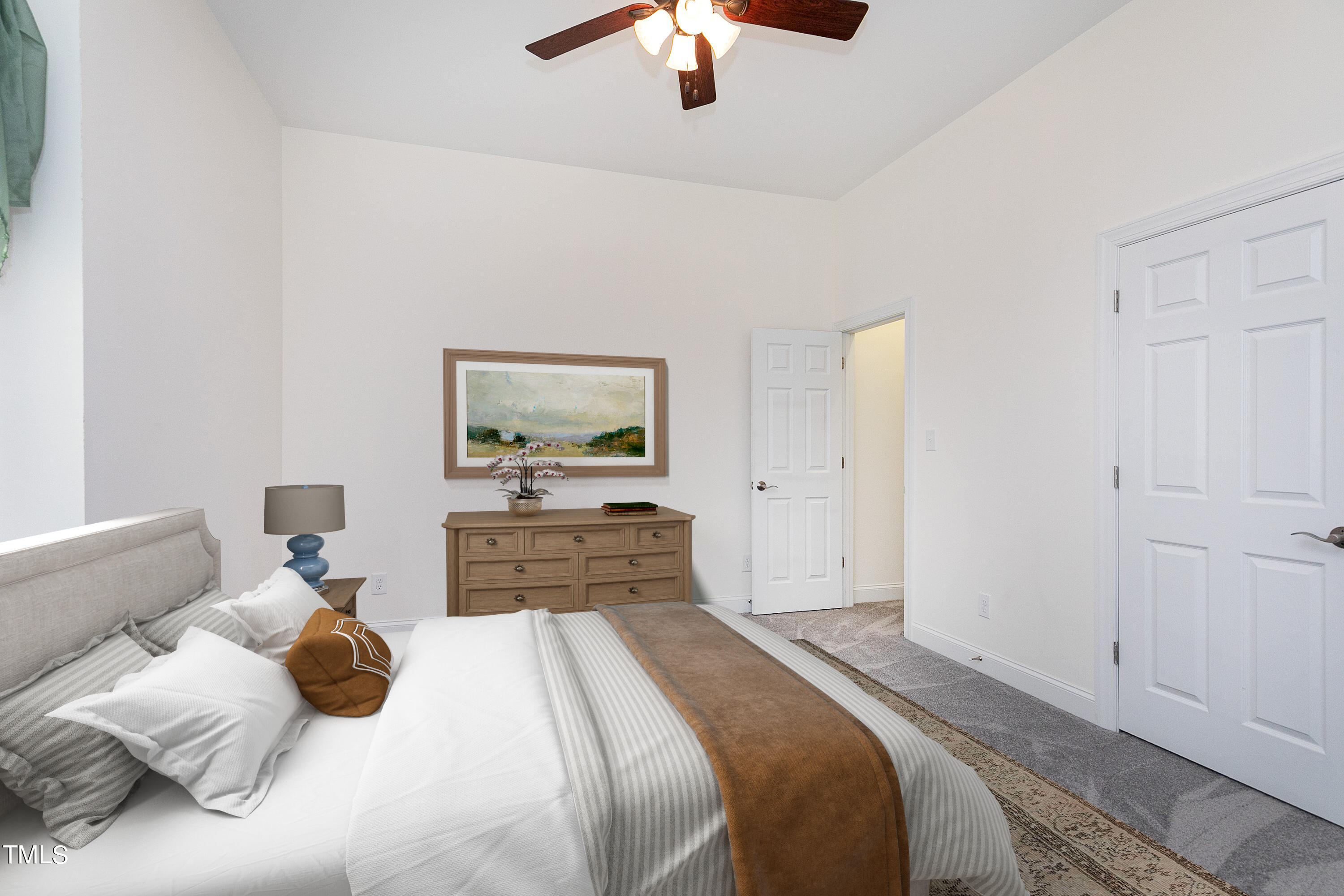 644 Uwharrie Ridge Road Chapel Hill, NC 27516 - Photo 30 of 43 a bedroom with a bed and a chandelier