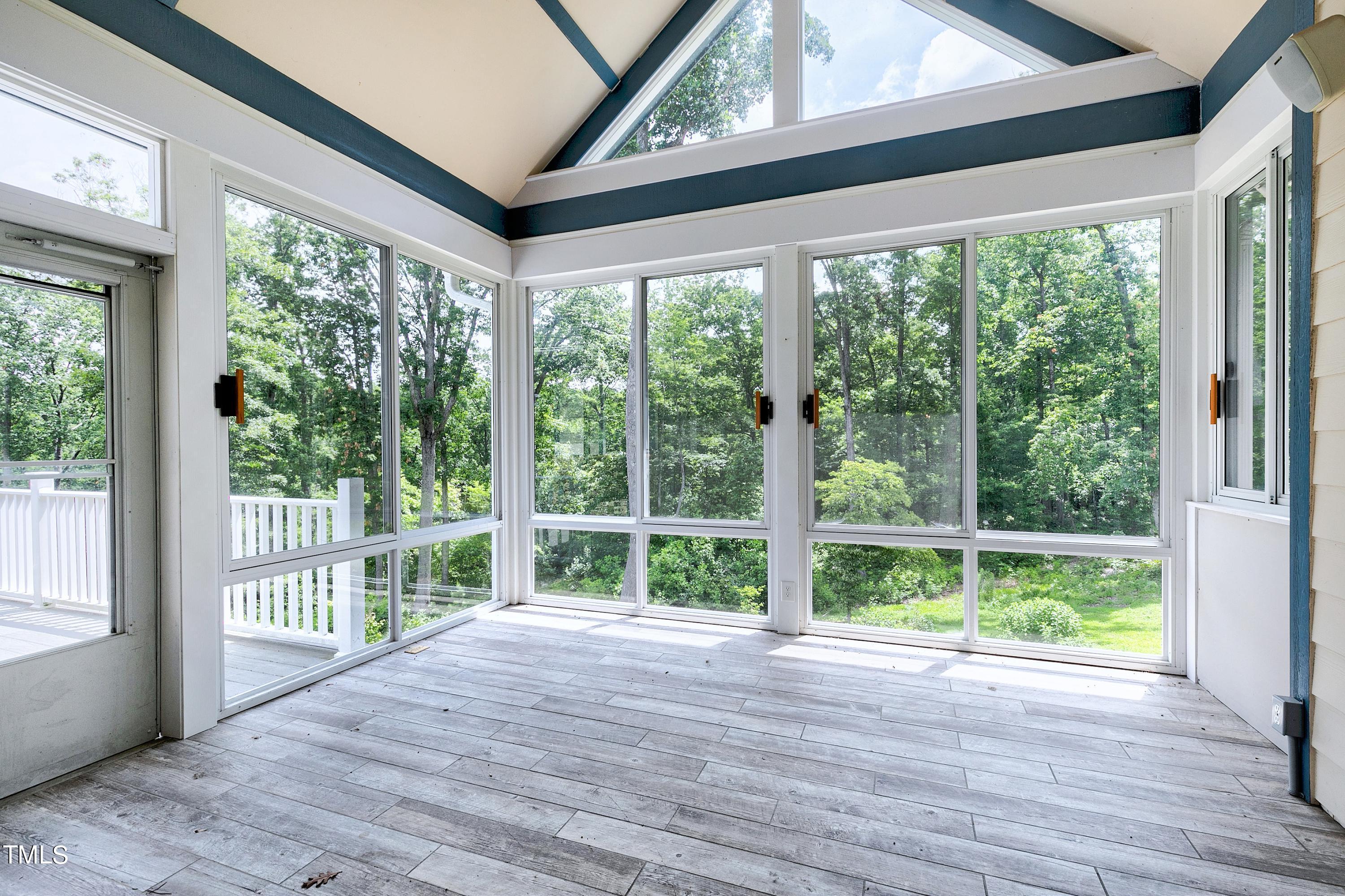 644 Uwharrie Ridge Road Chapel Hill, NC 27516 - Photo 32 of 43 a view of a deck and wooden floor