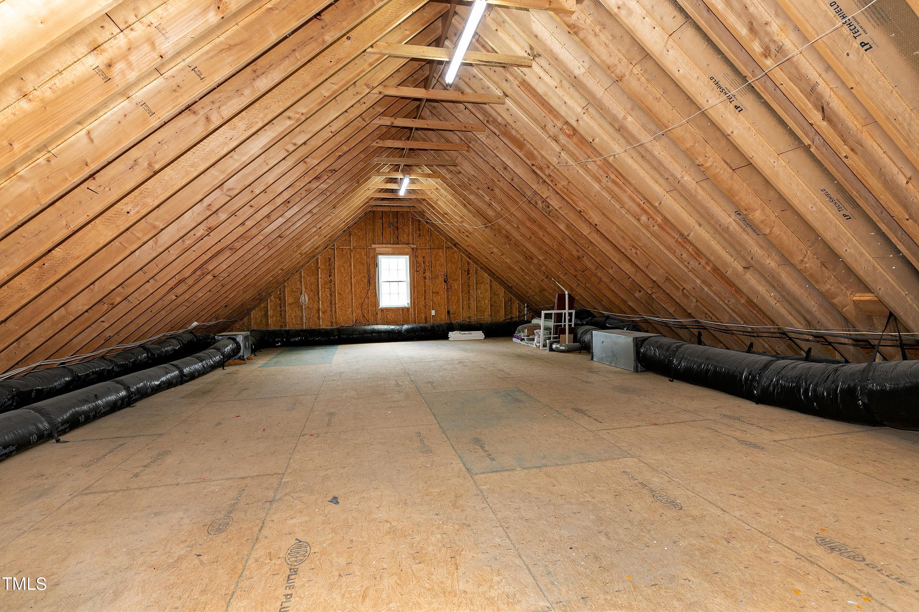 644 Uwharrie Ridge Road Chapel Hill, NC 27516 - Photo 34 of 43 a view of a big room with wooden walls
