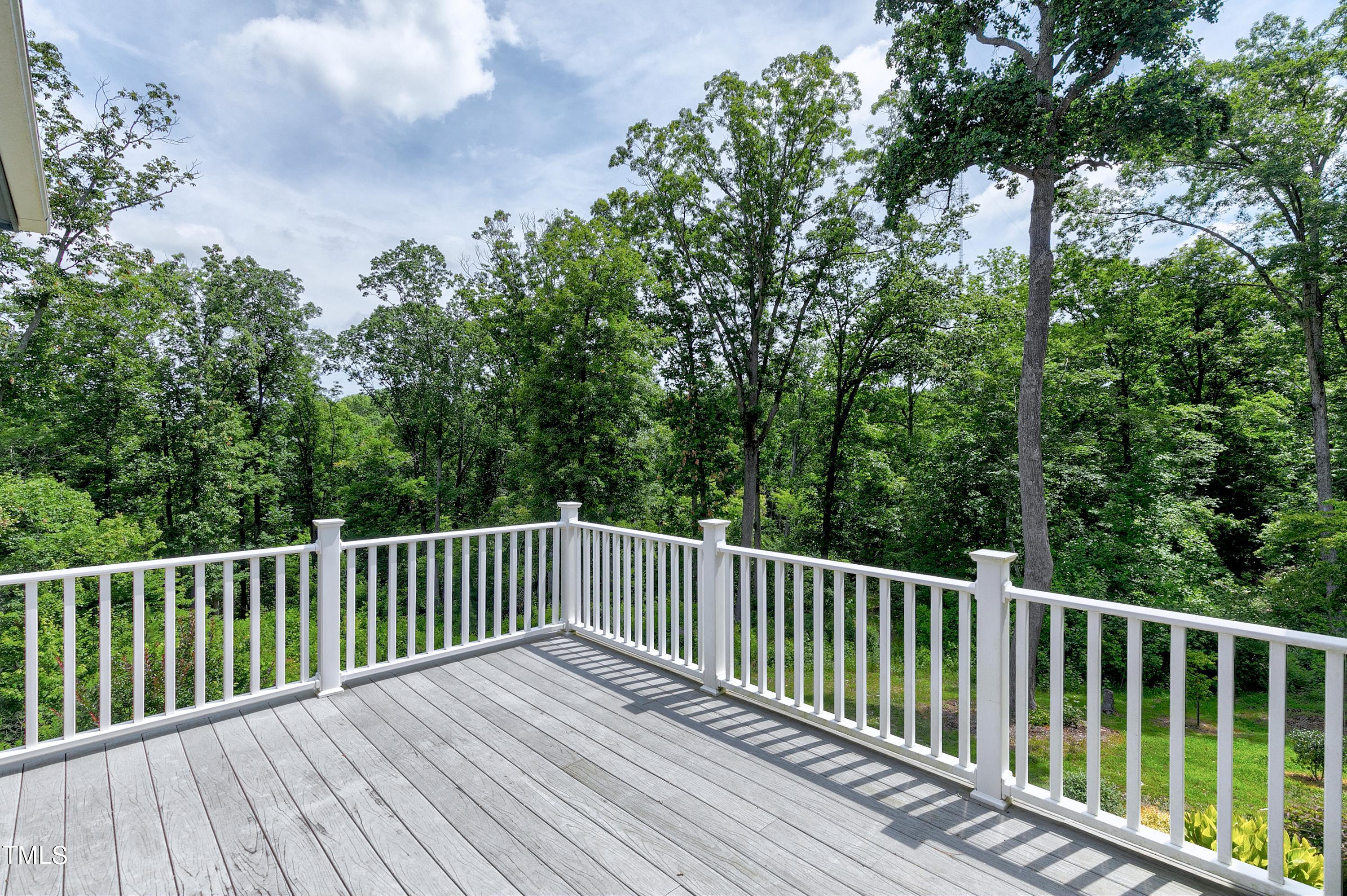 644 Uwharrie Ridge Road Chapel Hill, NC 27516 - Photo 36 of 43 a view of a wooden roof deck