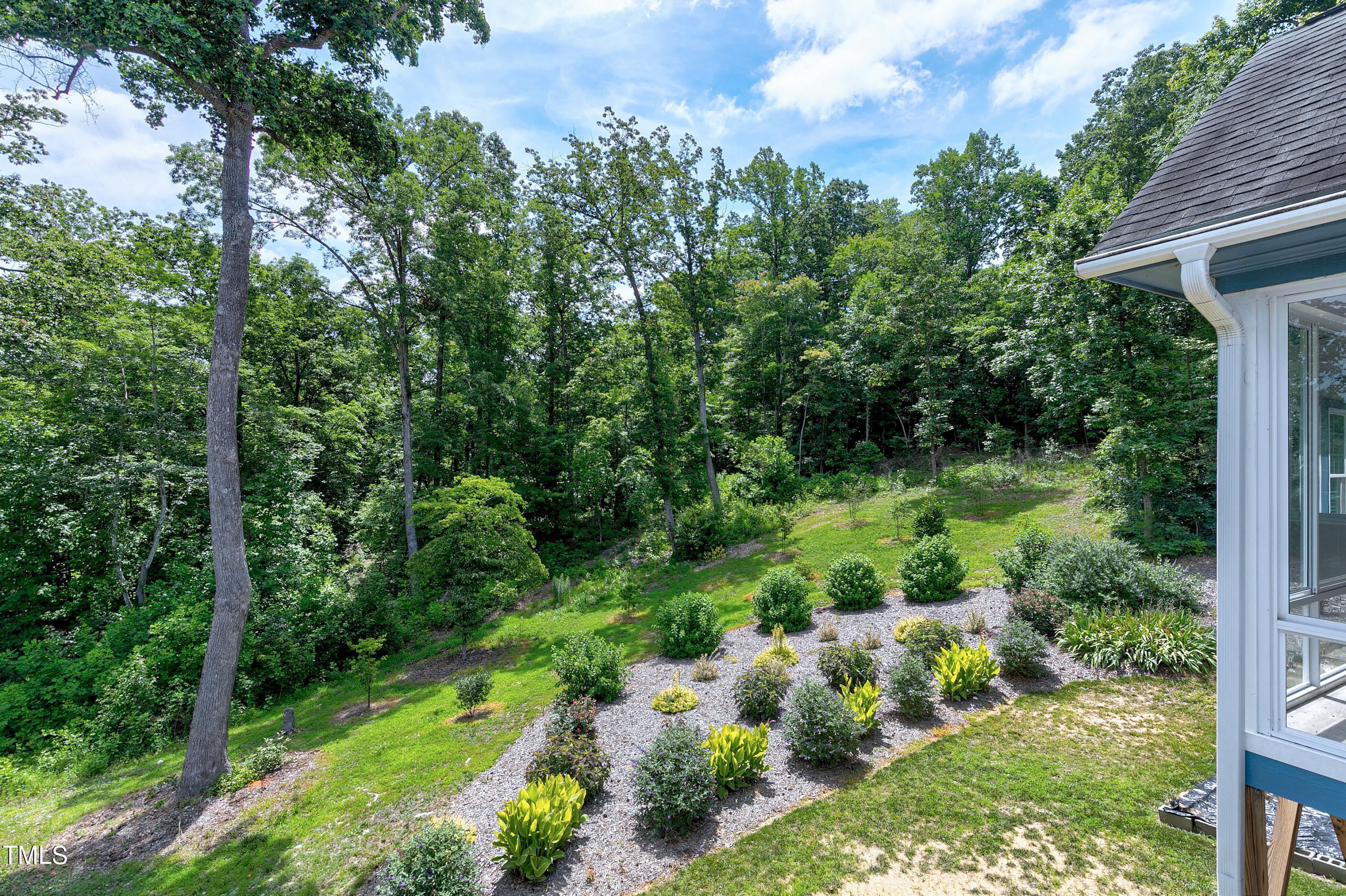 644 Uwharrie Ridge Road Chapel Hill, NC 27516 - Photo 37 of 43 a view of a garden with plants