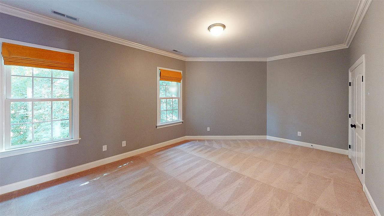 412 Thyme Place Raleigh, NC 27609 - Photo 15 of 26 One of the Large Secondary Bedrooms