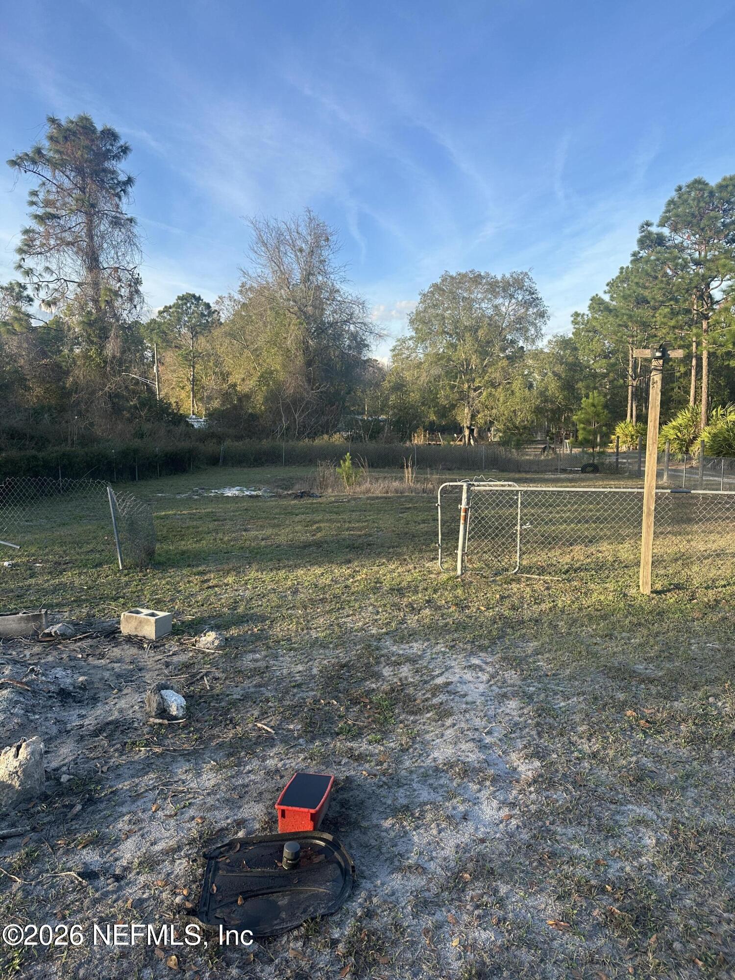 10269 Grayson Street Jacksonville, FL 32220 - Photo 2 of 9 a lake view with a houses