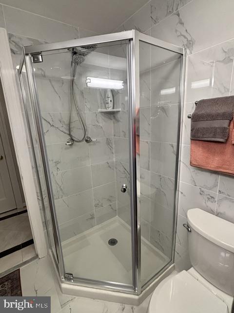608 6th Place Southwest Washington, DC 20024 - Photo 15 of 65 Sleek modern shower with elegant tiles.