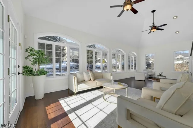 a kitchen with kitchen island a large counter top space appliances and cabinets