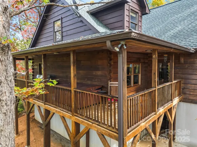 a view of a two chairs in the balcony