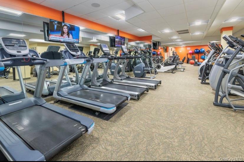 1 Bay Club Drive, Unit 6V Queens, NY 11360 - Photo 18 of 21 a view of a room with gym equipment