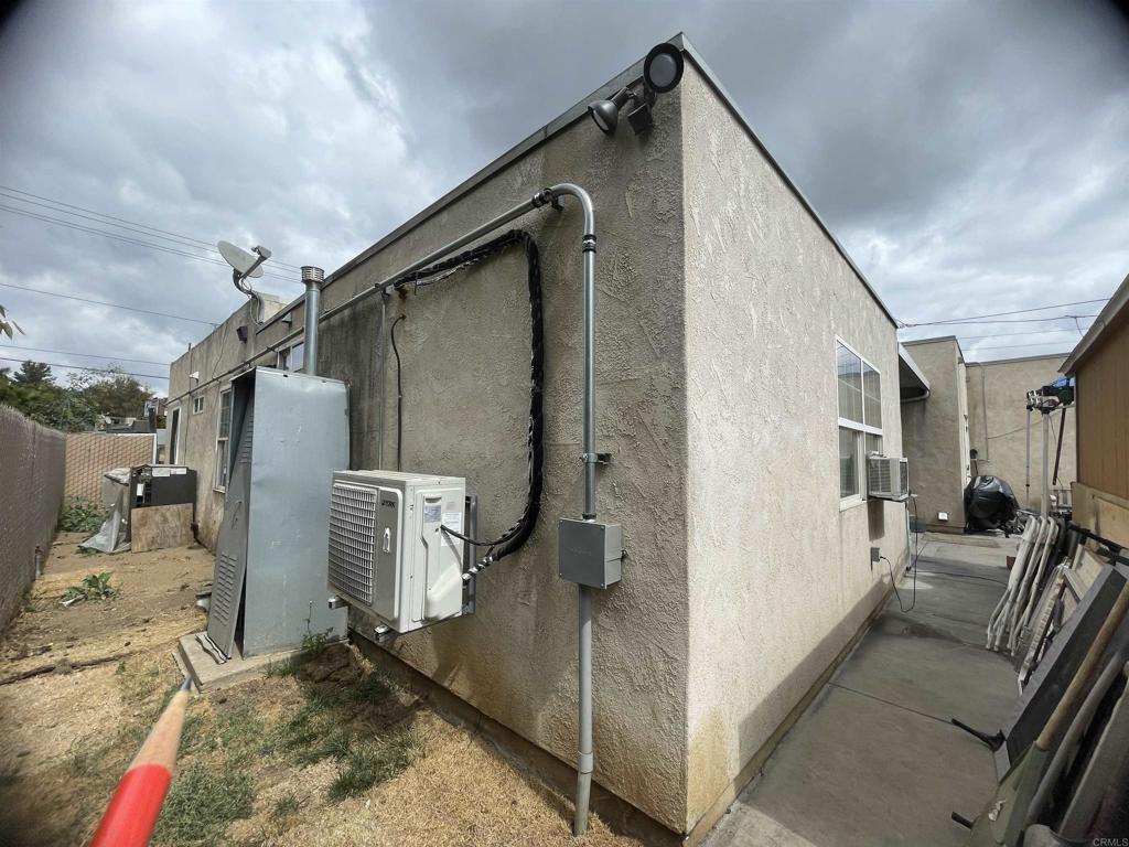 9141-43 Campo Road Spring Valley, CA 91977 - Photo 11 of 26 a view of living room and utility room