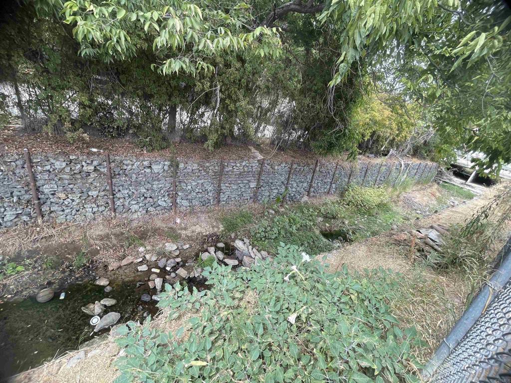 9141-43 Campo Road Spring Valley, CA 91977 - Photo 12 of 26 a view of garden with plants and trees