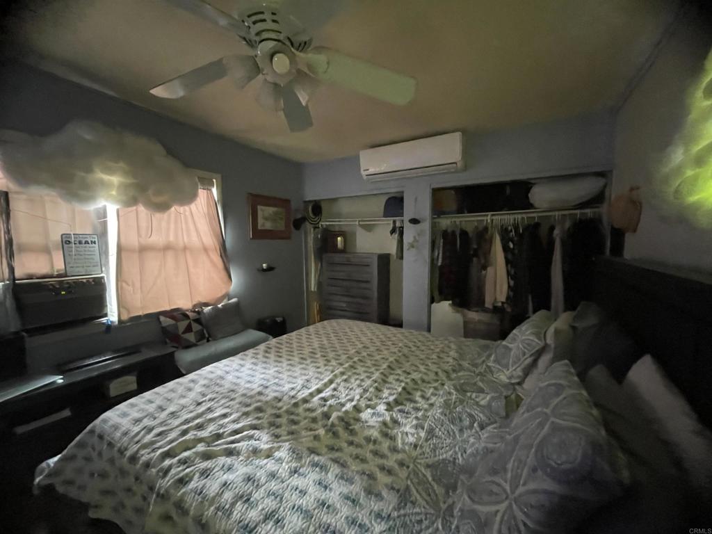 9141-43 Campo Road Spring Valley, CA 91977 - Photo 17 of 26 a bed room with a bed