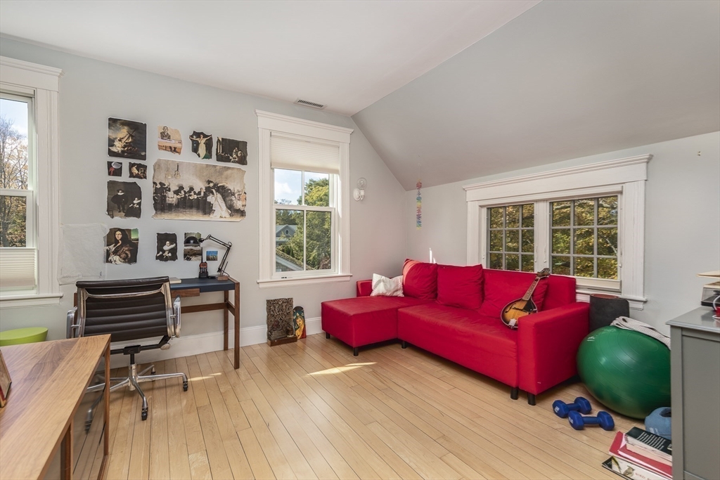 4 Ballast Lane Marblehead, MA 01945 - Photo 27 of 42 a living room with furniture and a window
