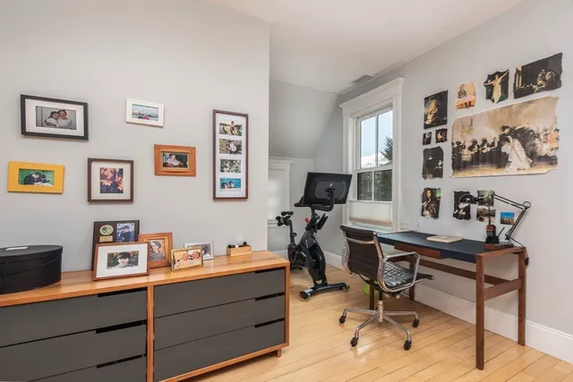 a view of a workspace with furniture