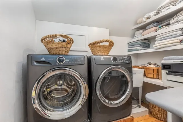 a utility room with dryer and washer