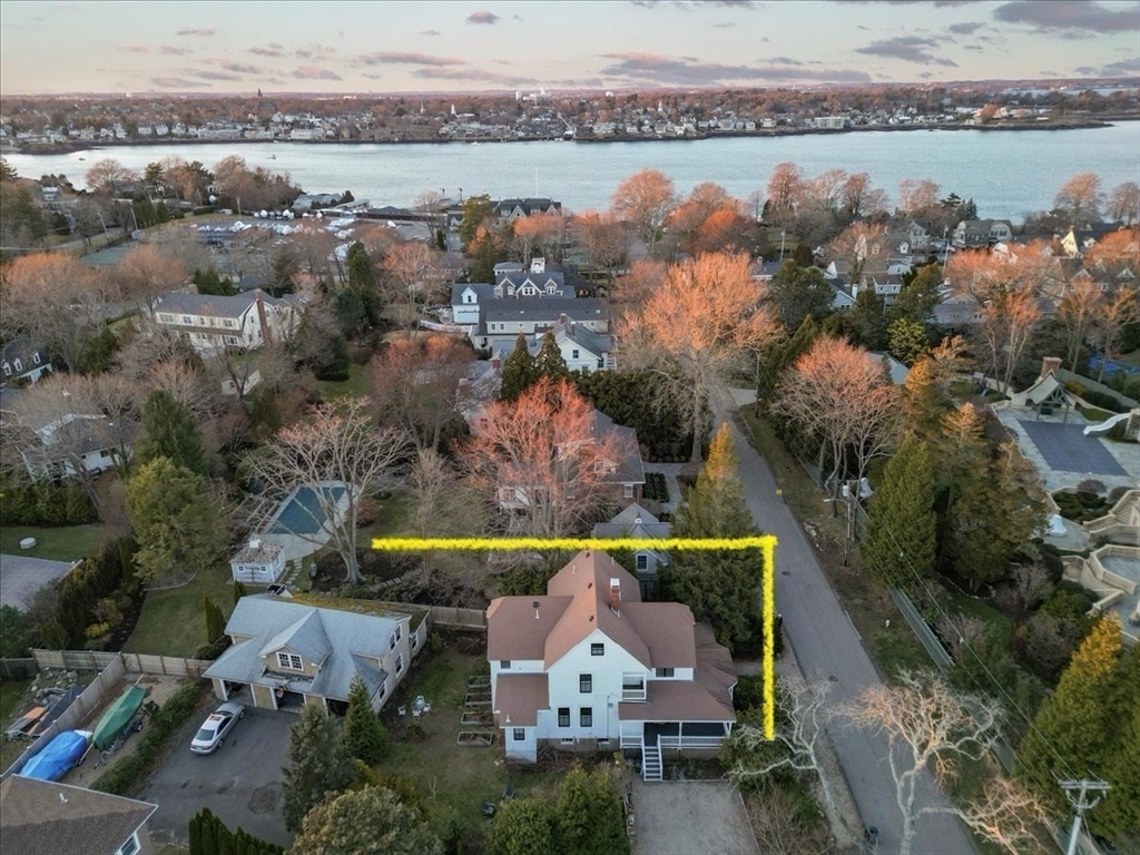 4 Ballast Lane Marblehead, MA 01945 - Photo 3 of 42 an aerial view of house with yard lake and ocean view