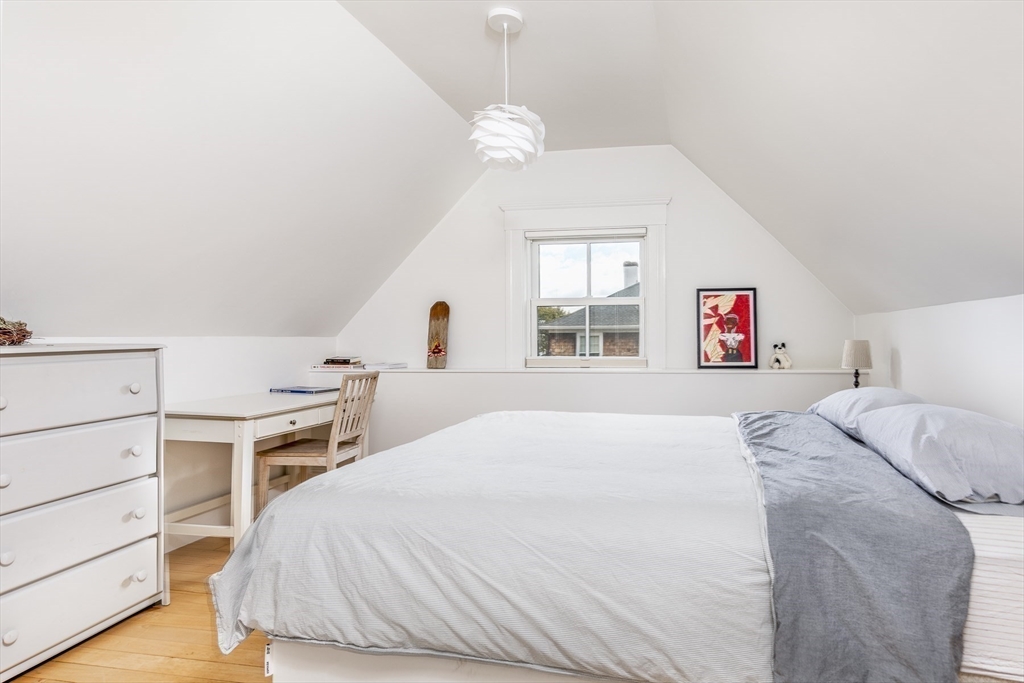 4 Ballast Lane Marblehead, MA 01945 - Photo 31 of 42 a bedroom with a bed and a dresser