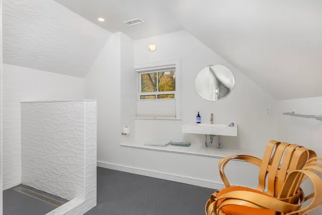 a bathroom with a bathtub and a sink