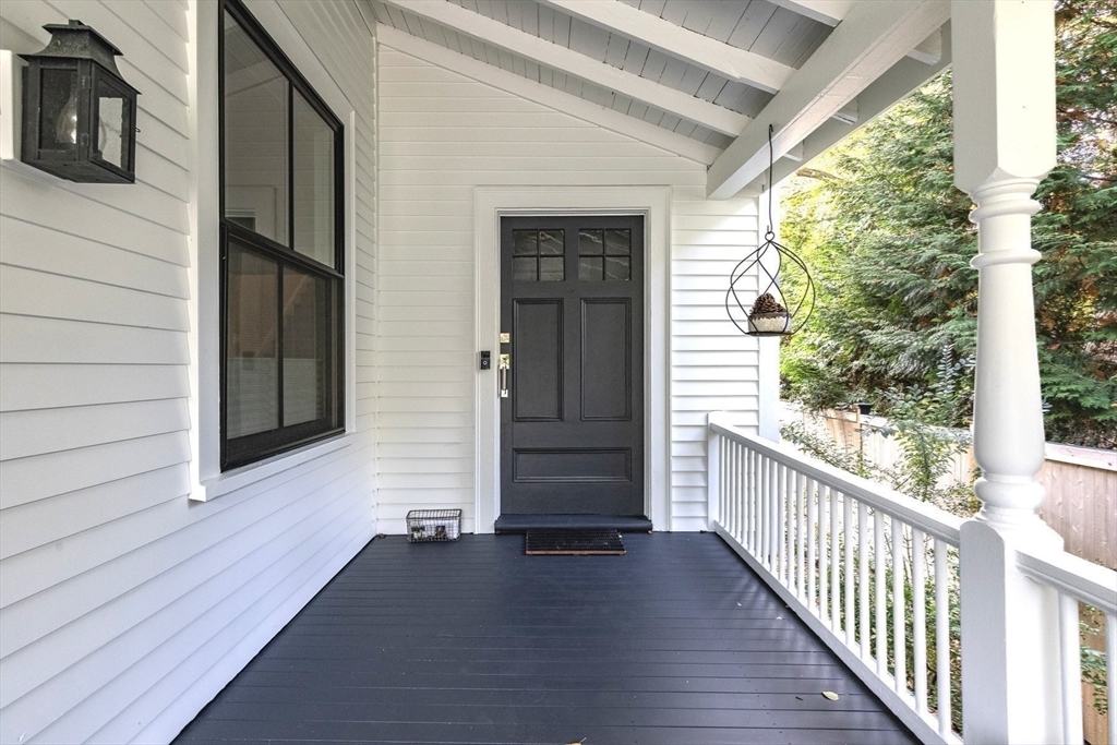 4 Ballast Lane Marblehead, MA 01945 - Photo 5 of 42 a view of a porch with wooden floor and stairs