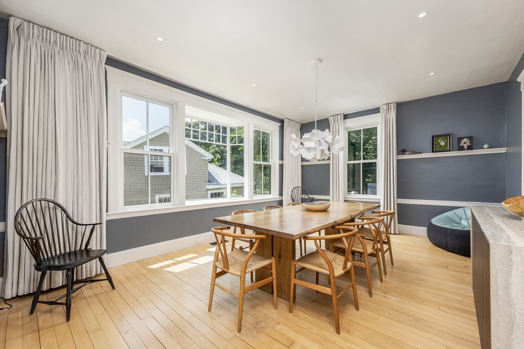 4 Ballast Lane Marblehead, MA 01945 - Photo 10 of 42 a view of a dining room with furniture and wooden floor