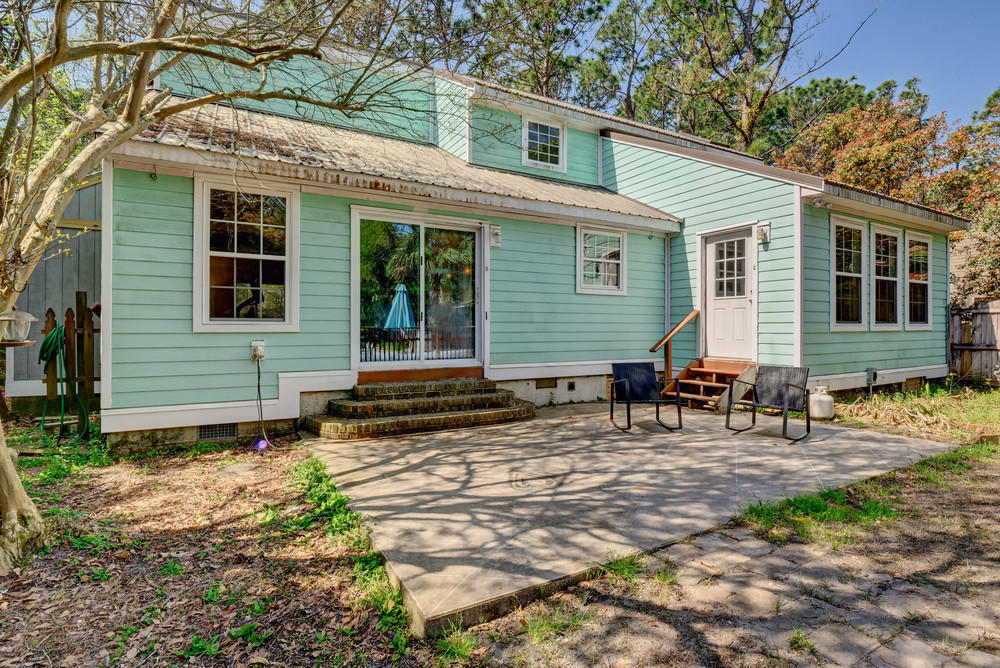 626 Hidden Valley Road Wilmington, NC 28409 - Photo 26 of 36 Back exterior and patio