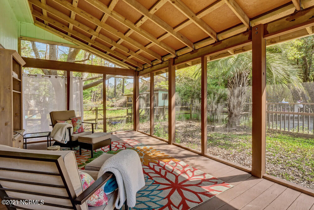 626 Hidden Valley Road Wilmington, NC 28409 - Photo 32 of 36 Screened porch