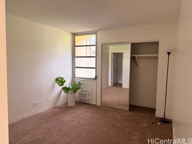 3161 Ala Ilima Street, Unit 107 Honolulu, HI 96818 - Photo 15 of 23 a view of an empty room and a windows
