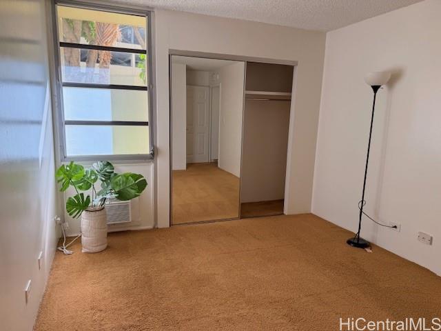 3161 Ala Ilima Street, Unit 107 Honolulu, HI 96818 - Photo 16 of 23 a view of an empty room with a window