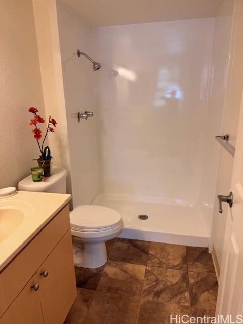 3161 Ala Ilima Street, Unit 107 Honolulu, HI 96818 - Photo 17 of 23 a bathroom with a sink a toilet and shower