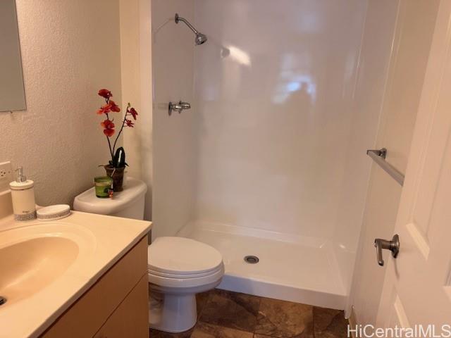 3161 Ala Ilima Street, Unit 107 Honolulu, HI 96818 - Photo 18 of 23 a bathroom with a sink a toilet and shower