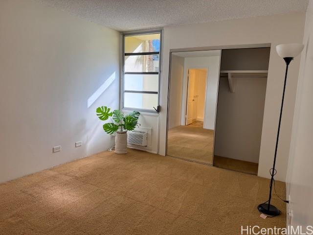 3161 Ala Ilima Street, Unit 107 Honolulu, HI 96818 - Photo 19 of 23 a view of an empty room with a window