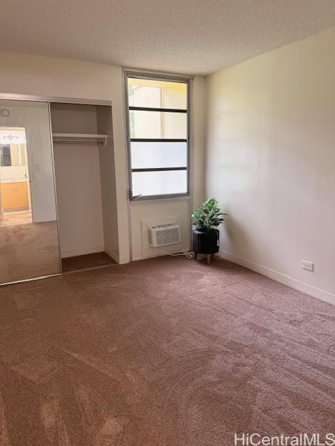 3161 Ala Ilima Street, Unit 107 Honolulu, HI 96818 - Photo 22 of 23 a view of an empty room and a window