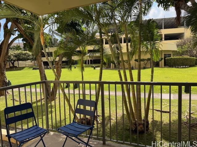 3161 Ala Ilima Street, Unit 107 Honolulu, HI 96818 - Photo 8 of 23 a view of a chairs and table in the balcony