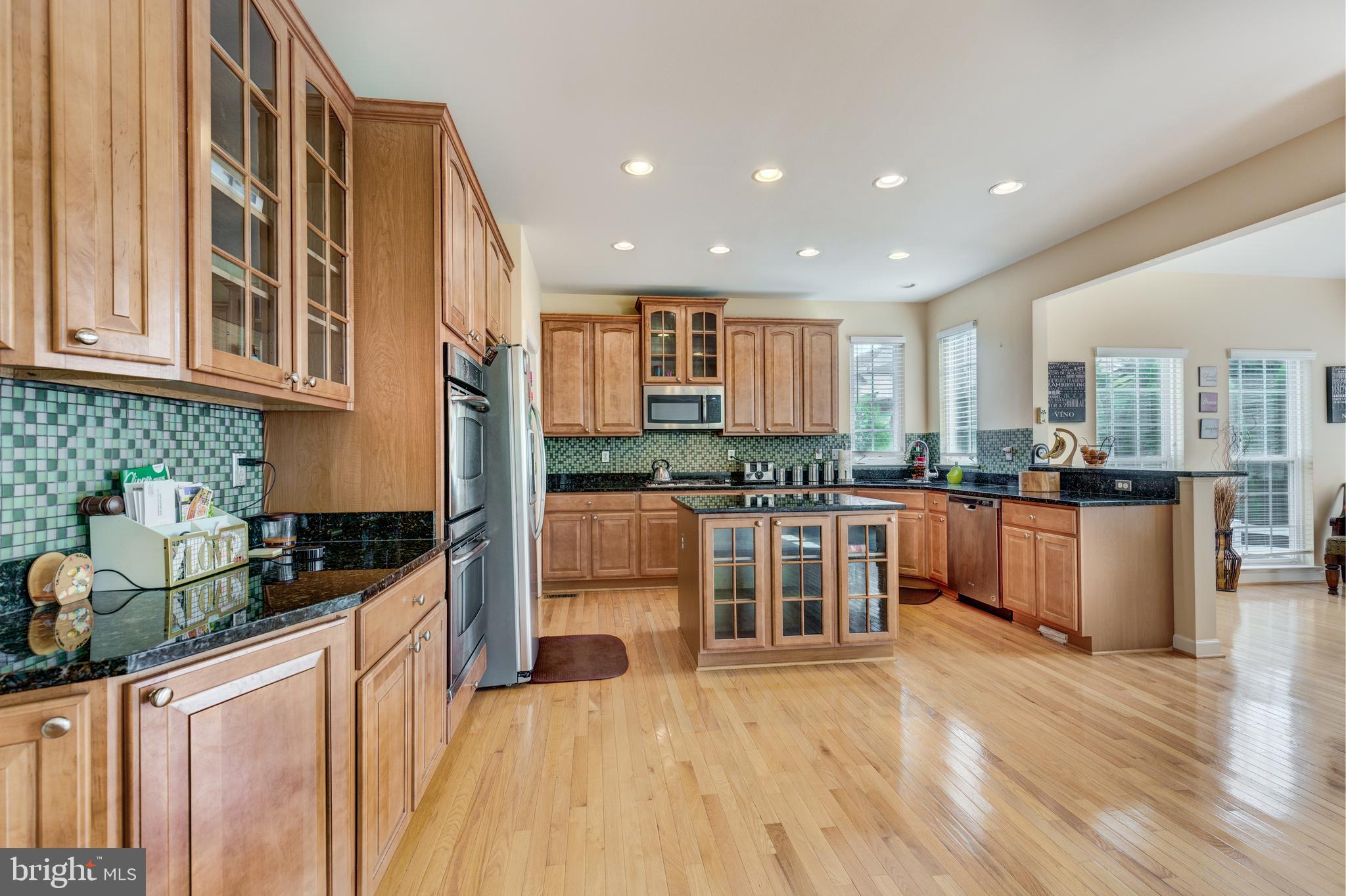 640 Spring Meadow Drive Westminster, MD 21158 - Photo 11 of 91 Multiple glass front cabinets.