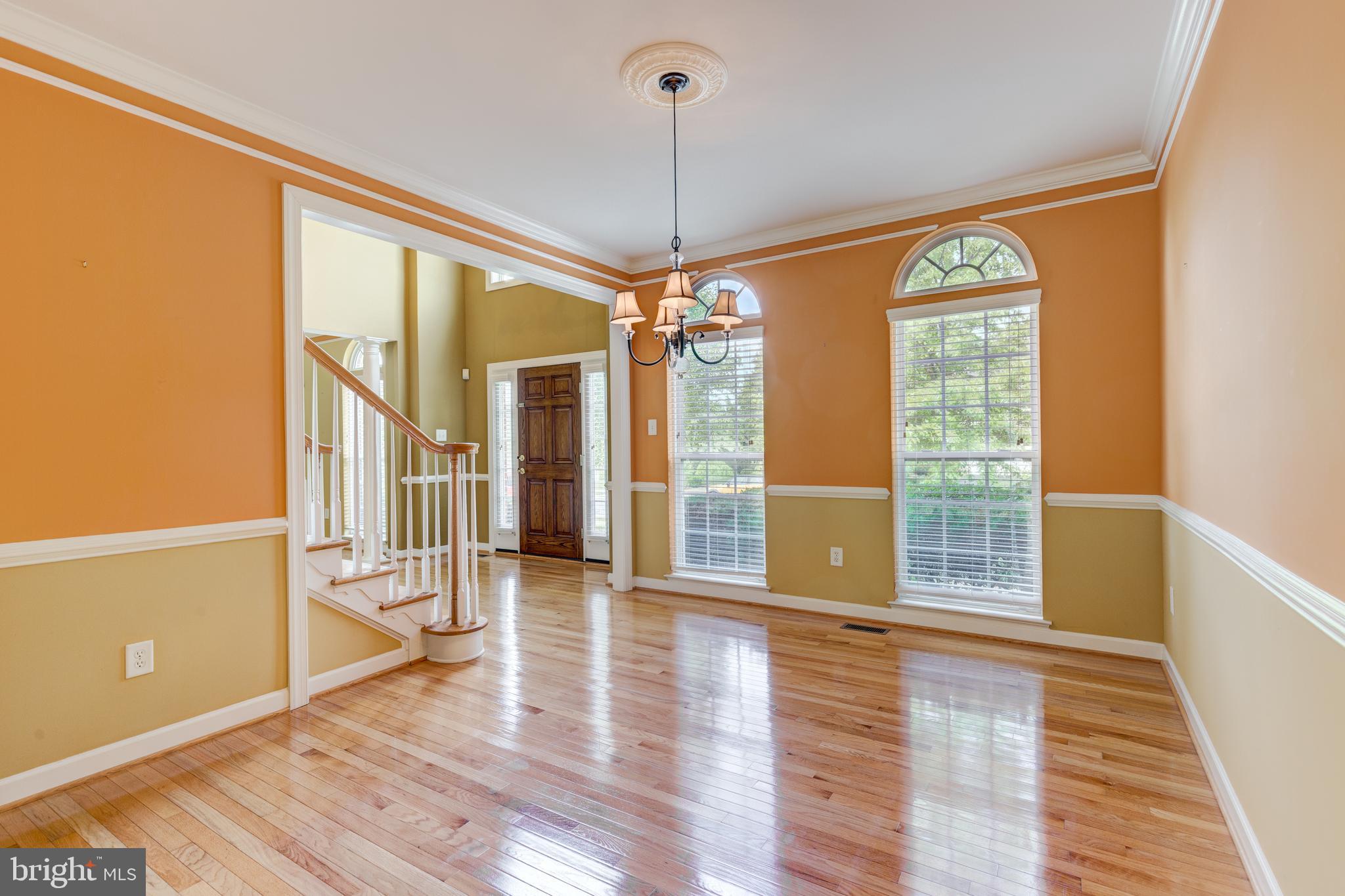 640 Spring Meadow Drive Westminster, MD 21158 - Photo 9 of 91 Dining room with chair railing and crown molding