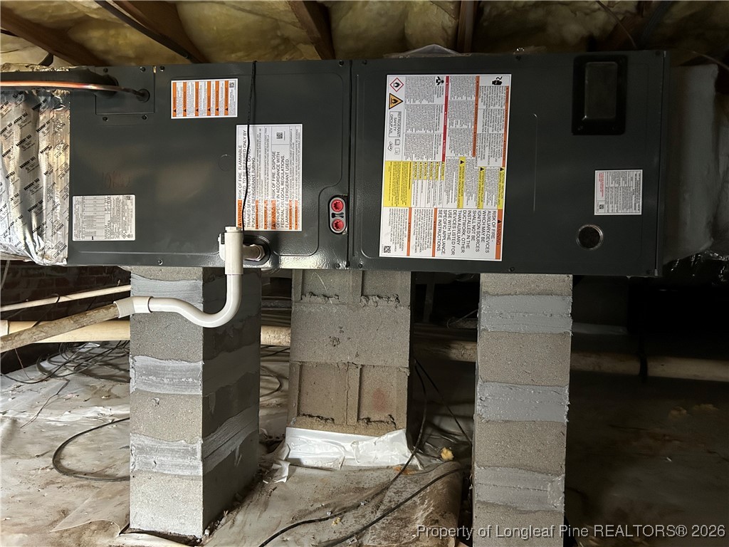 780 Wayside Road Raeford, NC 28376 - Photo 38 of 40 a bathroom with a sink and a mirror