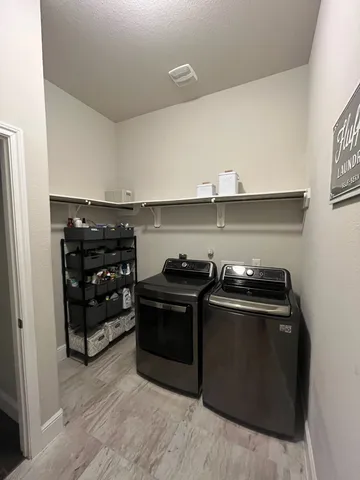 a stove top oven sitting inside of a kitchen