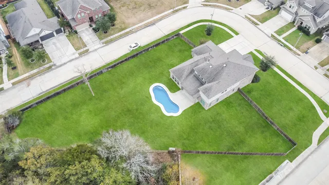 a view of swimming pool from a balcony
