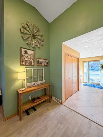 a room with pool table and a window