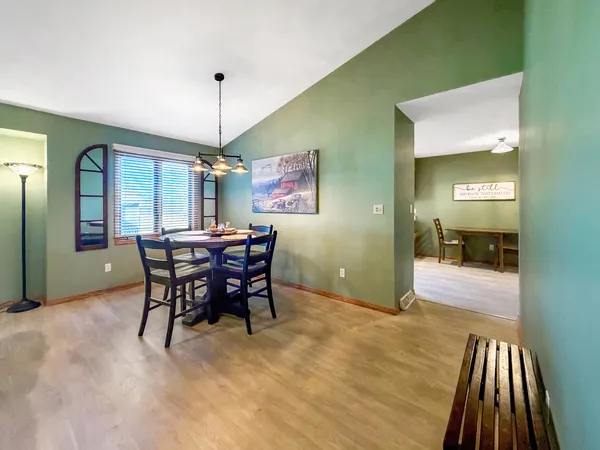 a view of a dining room with furniture