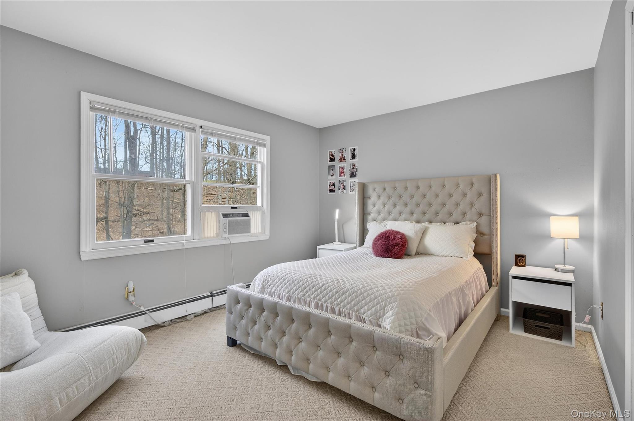 449 West Mombasha Road Monroe, NY 10950 - Photo 14 of 39 a bedroom with a large bed and a window