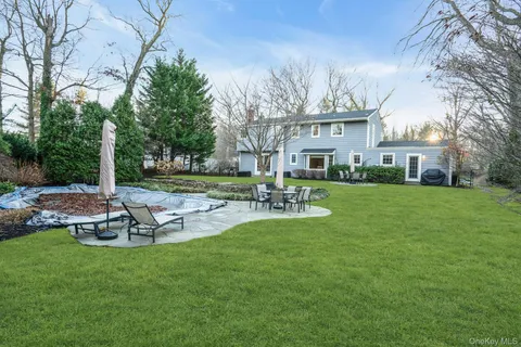 a view of a patio with a yard