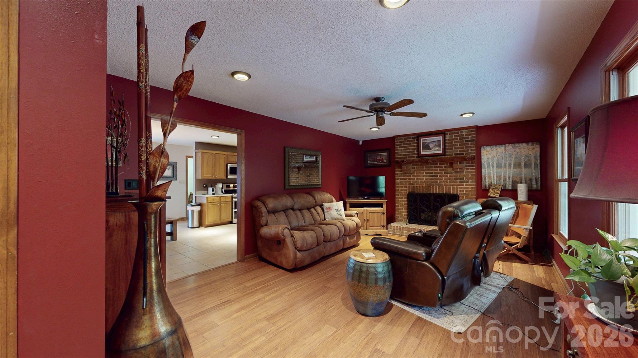 8720 Unionville-Brief Road Monroe, NC 28110 - Photo 20 of 35 a living room with furniture and a fireplace