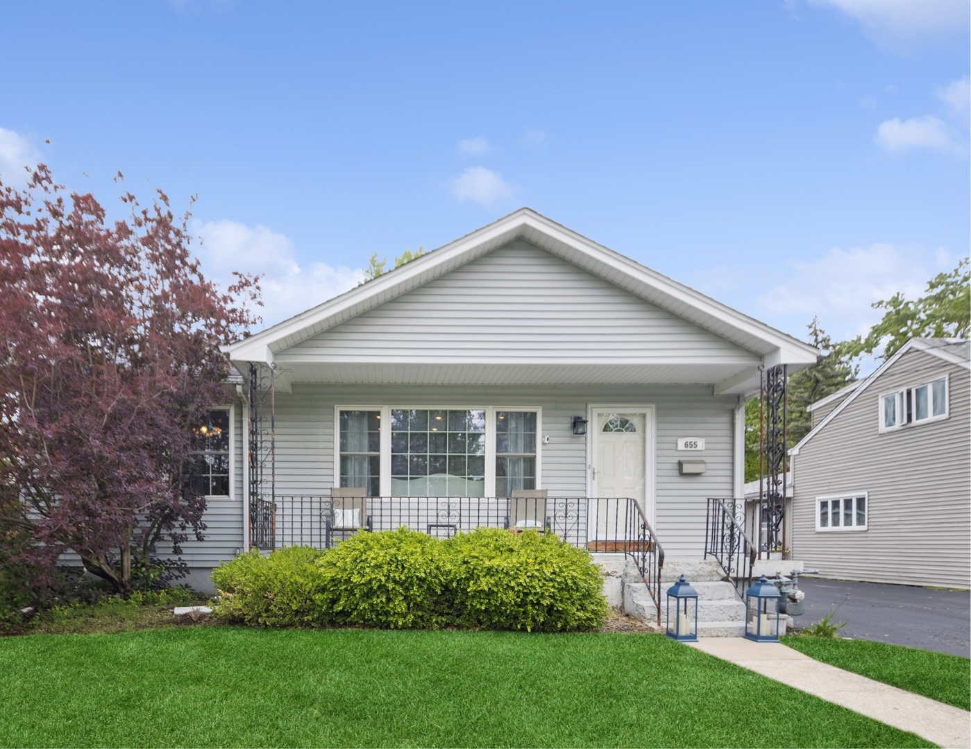 655 Thomas Street Elmhurst, IL 60126 - Photo 1 of 17 front view of a house with a yard