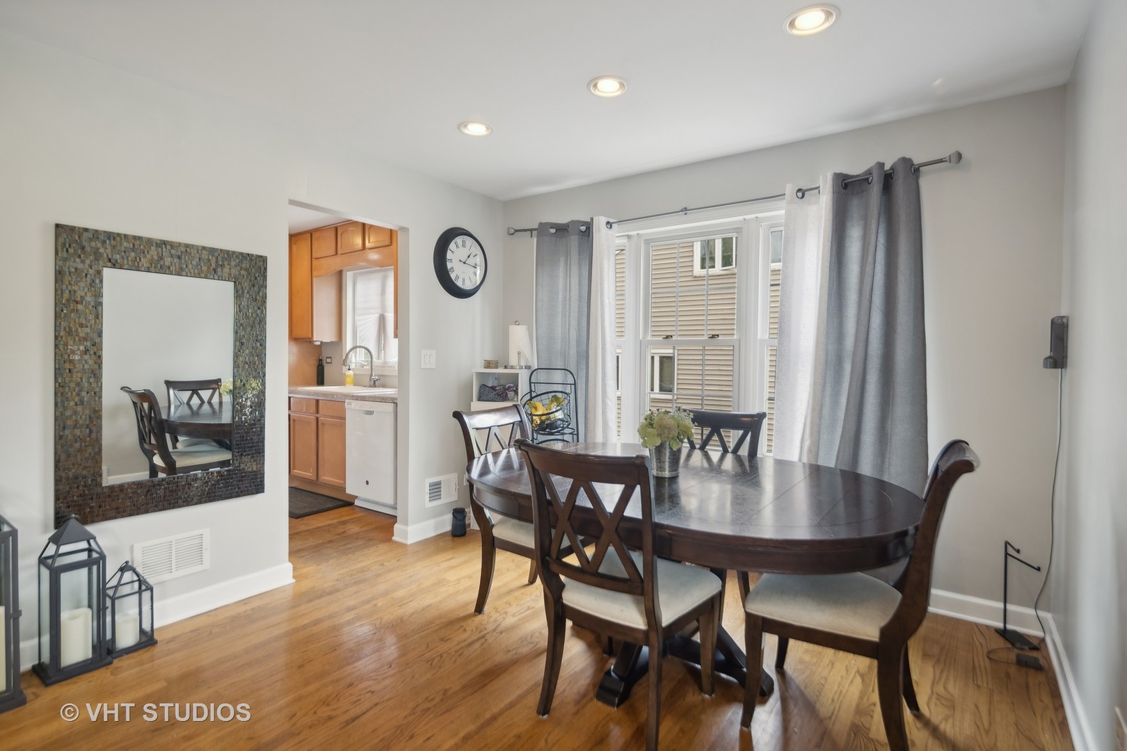 655 Thomas Street Elmhurst, IL 60126 - Photo 11 of 17 a view of a dining room with furniture and window