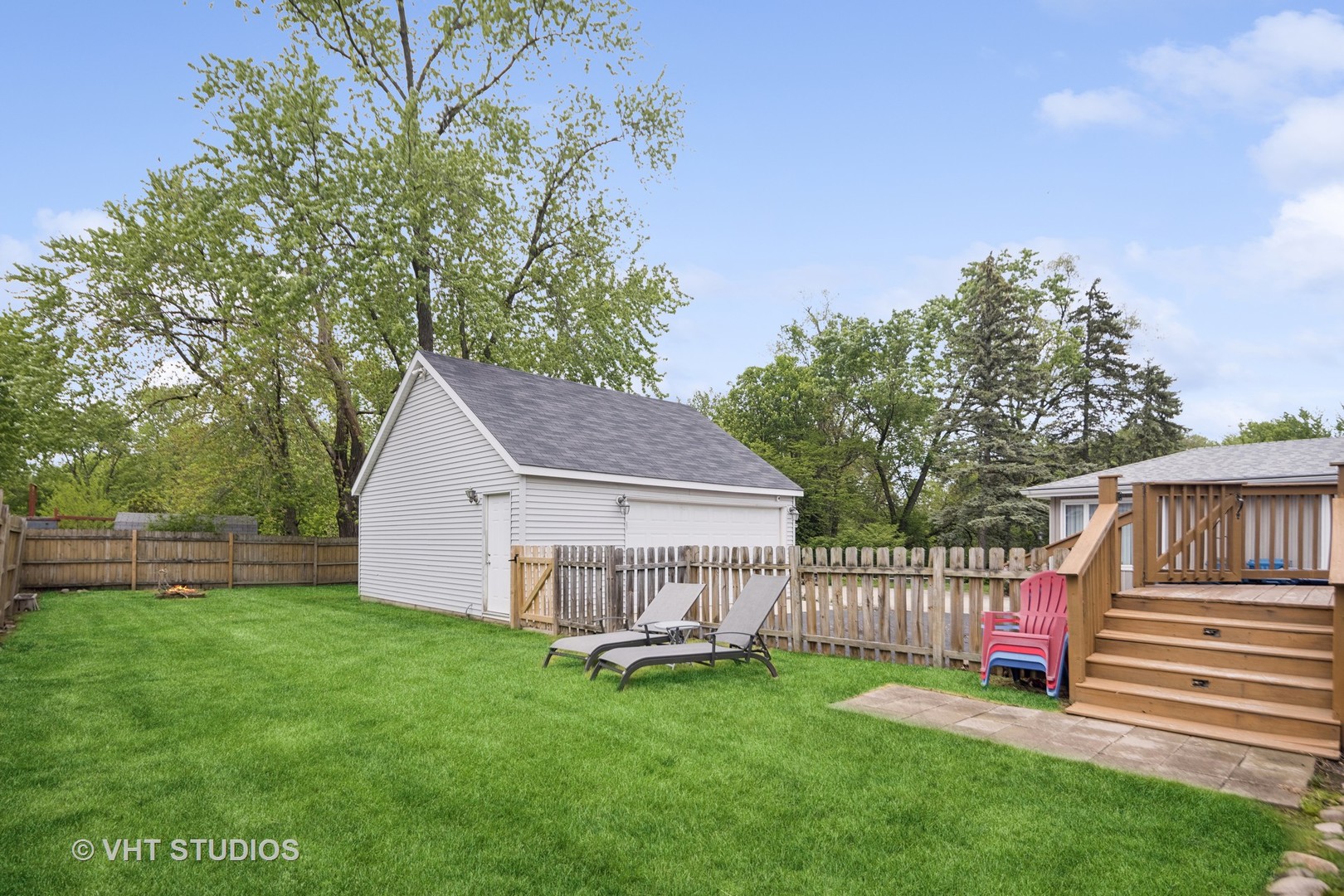 655 Thomas Street Elmhurst, IL 60126 - Photo 5 of 17 a view of backyard with deck and garden