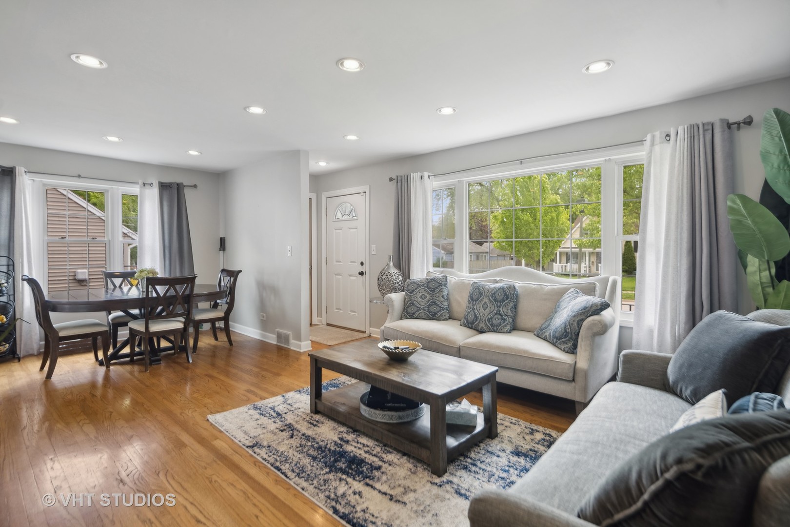 655 Thomas Street Elmhurst, IL 60126 - Photo 10 of 17 a living room with furniture and a large window
