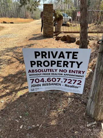 a sign on the side of the road