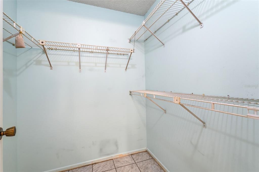 4544 Slippery Rock Road New Port Richey, FL 34653 - Photo 21 of 32 a view of a room with racks on the wall