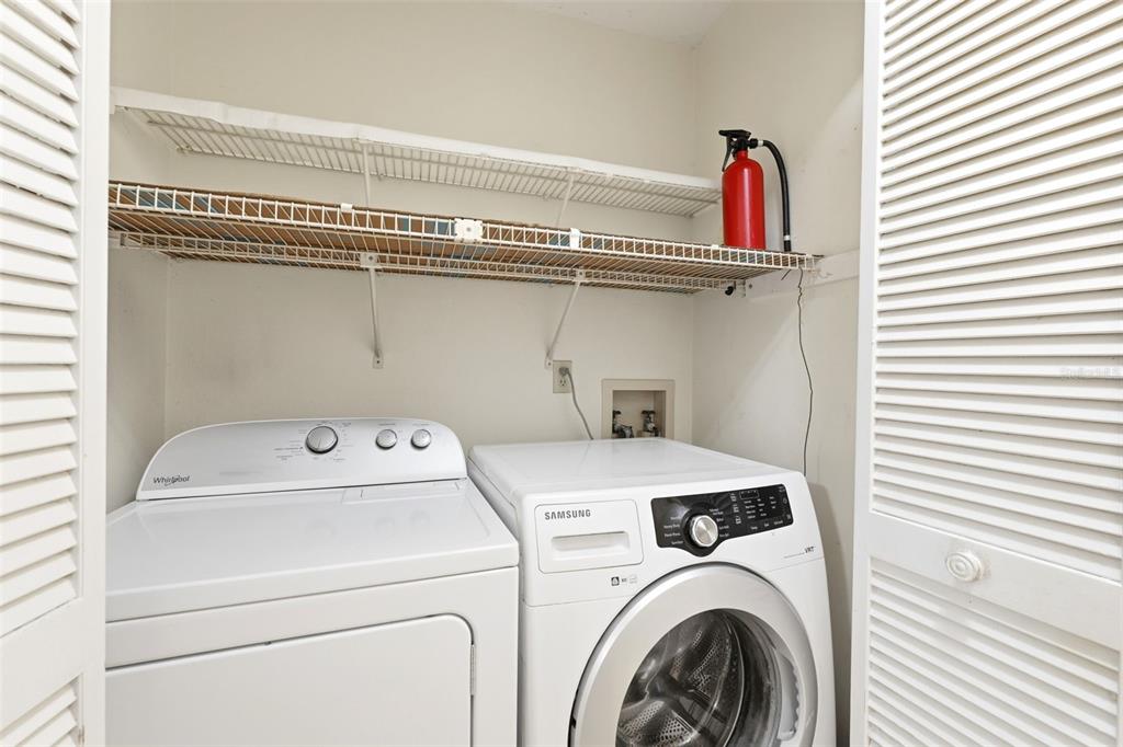 4544 Slippery Rock Road New Port Richey, FL 34653 - Photo 25 of 32 a utility room with dryer and washer