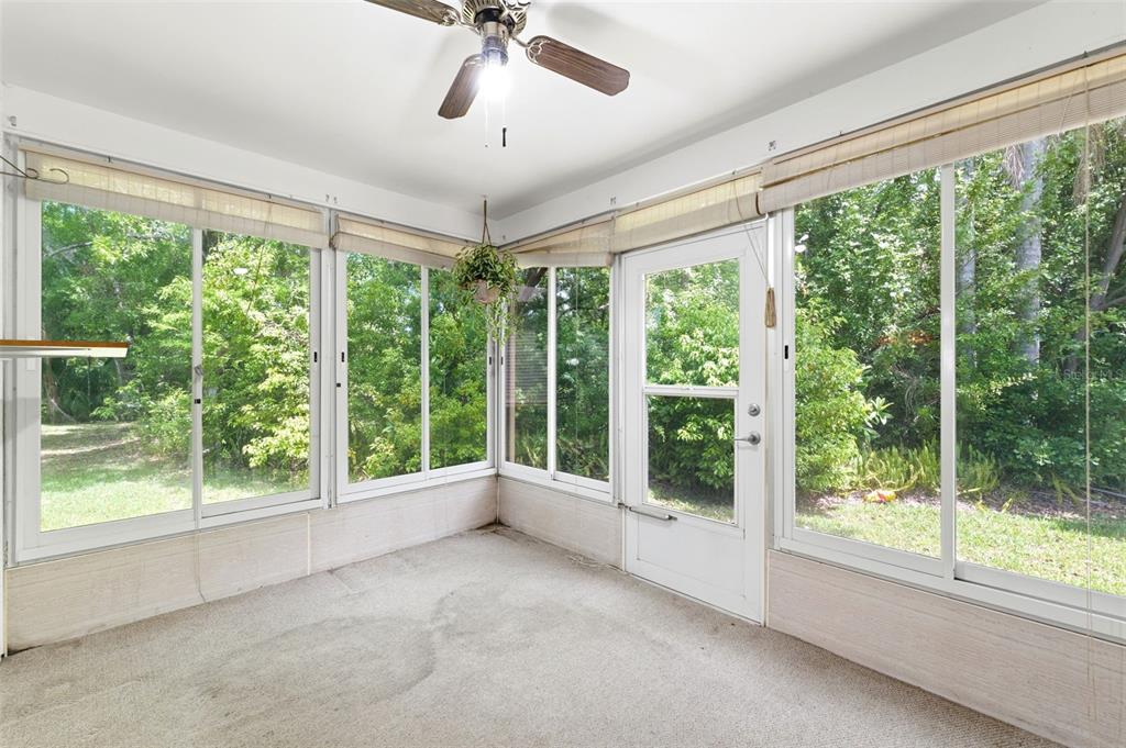 4544 Slippery Rock Road New Port Richey, FL 34653 - Photo 27 of 32 a view of room with window and ceiling fan