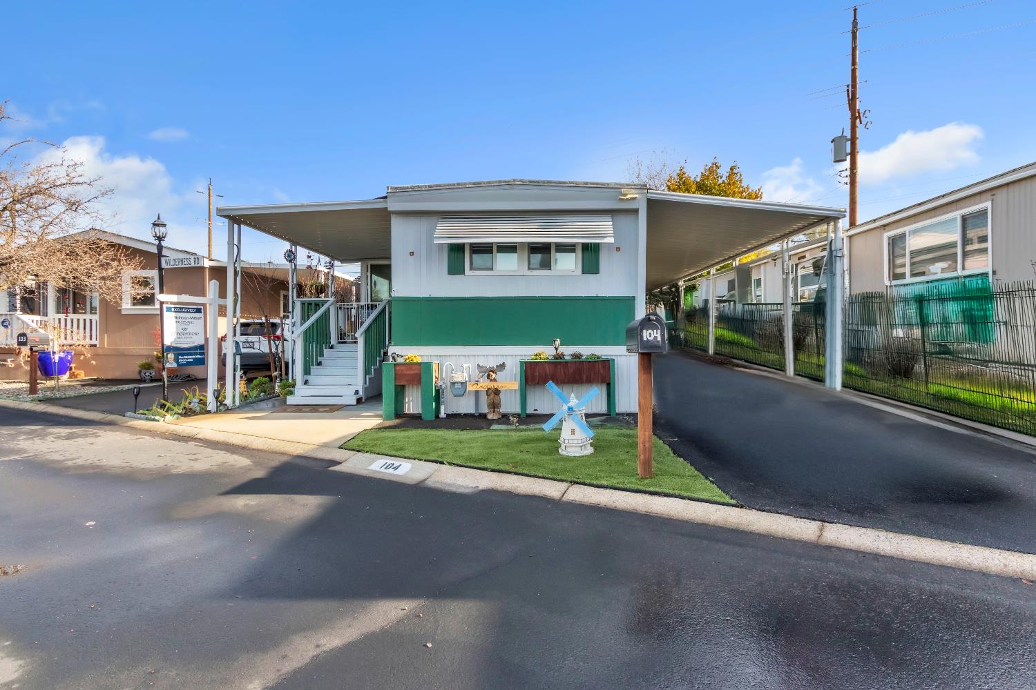 104 Wilderness Road Rancho Cordova, CA 95670 - Photo 1 of 29 a view of a house with a yard and table
